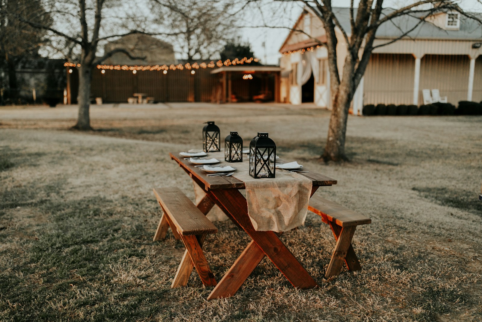 wooden dinning table in field for gathering